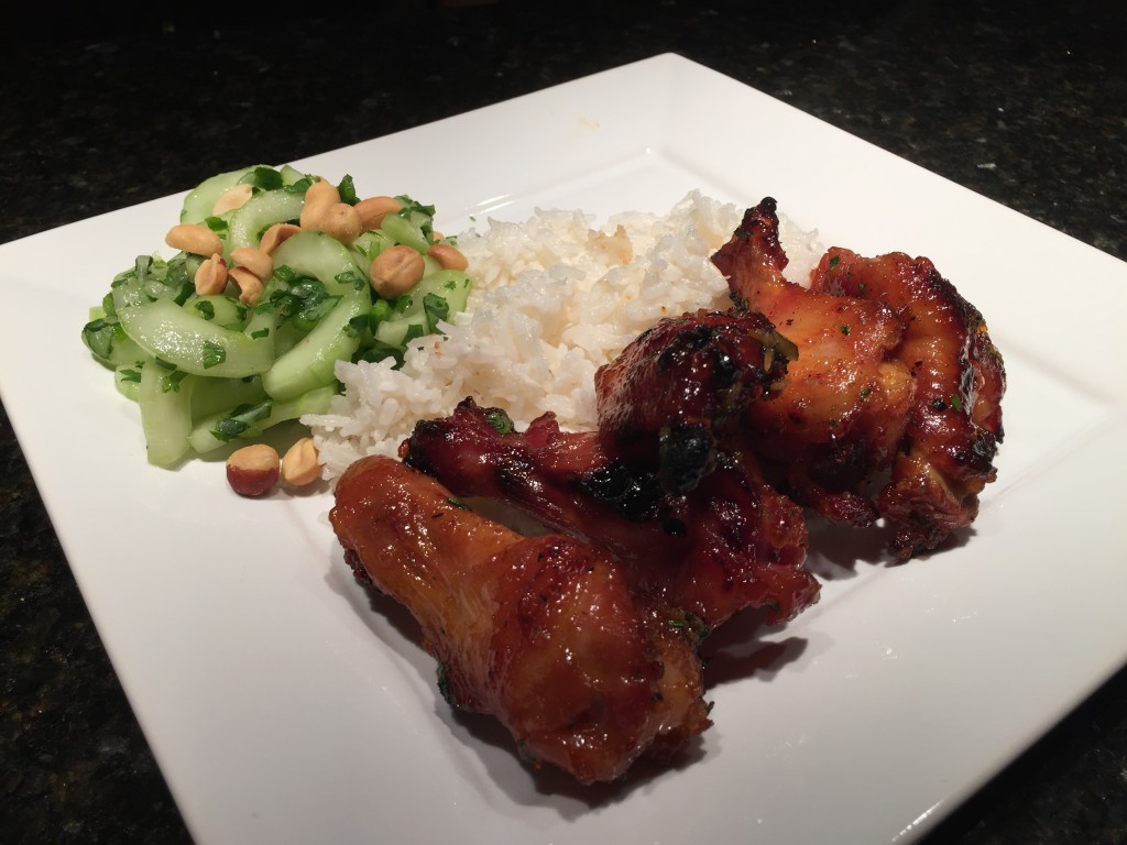 Wings served with Rice and Asian Cucumber Salad
